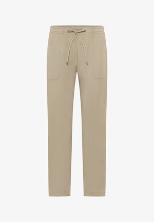 Beige Jogginghosen aus weichem Material mit einem Kordelzugbund, zwei Fronttaschen und einem schmal zulaufenden Bein design.