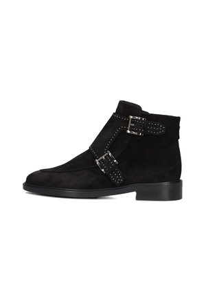 Black suede ankle boots with a smooth finish, featuring two buckled straps and studs on the outer side. Rounded toe and low heel design.