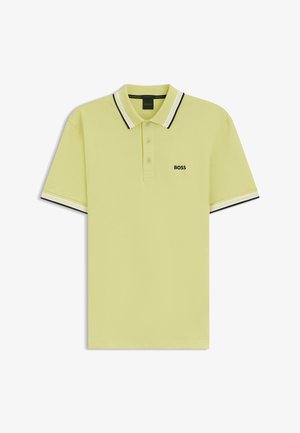 Light yellow short-sleeve polo shirt with black and white striped collar and sleeve edges, featuring a small "BOSS" logo on the chest.