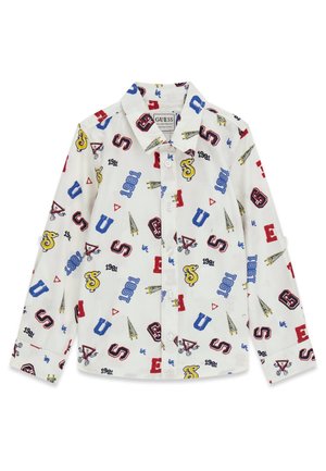 Chemise blanche à manches longues avec boutons, imprimée de lettres, chiffres et symboles colorés en rouge, bleu, jaune et noir dispersés partout.