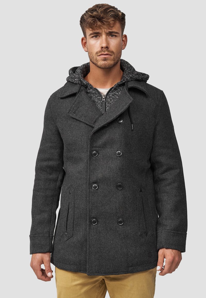 Grijze wollen peacoat met dubbele knopen, voorzien van een capuchon en een gestructureerde voering. Zakken aan de zijkanten en een stevig ontwerp.