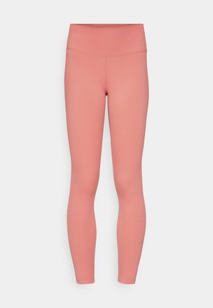 Rosa dehnbare Leggings mit hohem Bund, glatter Textur und minimalen Nähten. Verfügt über ein kleines Nike-Logo in der Nähe des Knöchels.