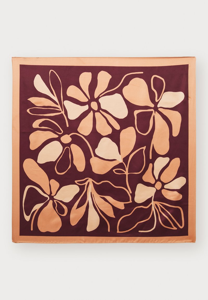 Silk scarf featuring a maroon background with large, abstract floral patterns in soft peach and beige shades, outlined in a contrasting color.