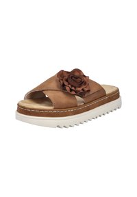 Brown leather slide sandal featuring a raised rose accent, a cushioned footbed, and a white rugged outsole with a zigzag pattern.
