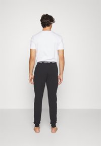 Björn Borg CORE LOUNGEWEAR PANTS - Calças de pijama - black
