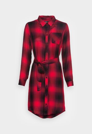 Red and black plaid shirt dress, button-down front, long sleeves, single chest pocket, belted waist, lightweight fabric, curved hem.