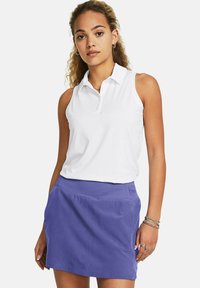 White sleeveless polo shirt with button placket paired with a purple skort. Smooth fabric with a relaxed fit and side pockets.