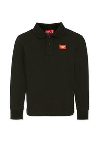 Polo shirt noir à manches longues en coton. Il dispose d'une patte de boutonnage à deux boutons, de poignets côtelés et d'une étiquette logo Diesel rouge sur la poitrine gauche.