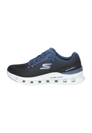Zapato deportivo Skechers en azul marino y negro con suela acolchada blanca que presenta aberturas ventiladas y cierre de cordones.