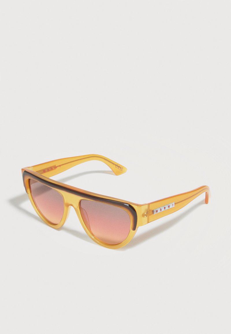 Yellow translucent sunglasses with pink gradient lenses and Marni logo on the temples, angled on a white surface.