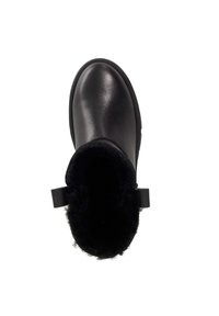 Black leather ankle boot with a rounded toe, soft black fur lining, and a fabric strap on the back for easy wear. Smooth texture.