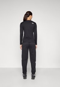 The North Face W MOUNTAIN ATHLETICS FLEECE PANT - Trainingsbroek - black
