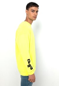 ELHO MAYRHOFEN - Sweatshirt - neon yellow