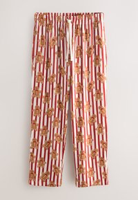 Rood-wit gestreepte pyjamabroek met een patroon van peperkoekmannetjes. Elastische tailleband met trekkoord. Zachte stof, losse pasvorm.