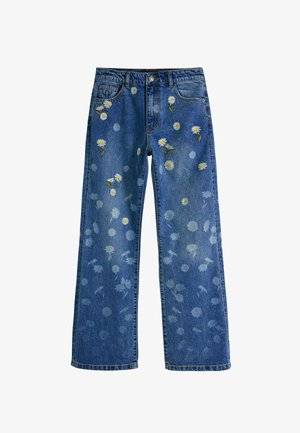 High-waisted blue denim jeans with wide legs, featuring floral embroidery in white and yellow, and faded, distressed detailing throughout.