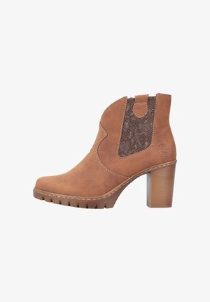 Brown suede ankle boot with a textured brown elastic panel, curved design, and a block heel. Features stitching details and a rugged sole.