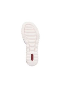 Semelle d'une sneaker, en caoutchouc blanc avec un motif nervuré pour l'adhérence, comportant un petit logo rouge et une finition lisse le long des bords.