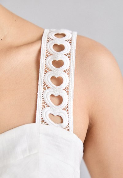 sandro BRASSIERE A VOLANTS ET GALONS COEUR - Top - blanc