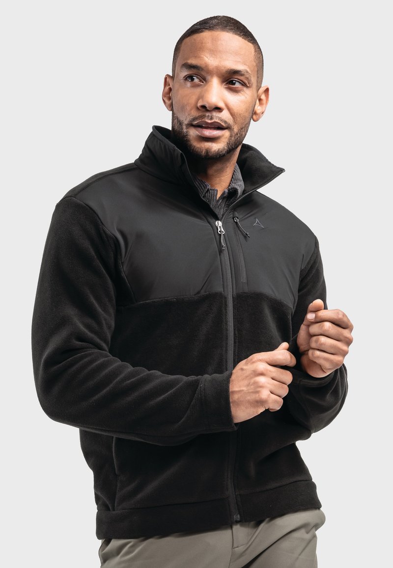 Schwarze Fleecejacke mit durchgehendem Reißverschluss, hohem Kragen und kontrastierendem glattem Stoff im oberen Bereich. Verfügt über ein Logo und strukturierte Ärmel.