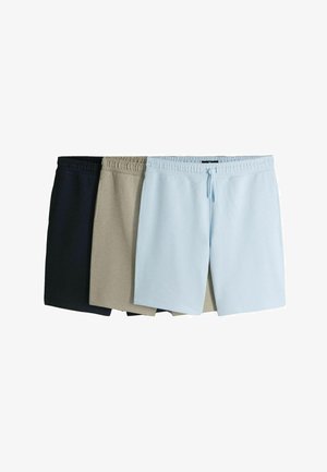 Trois paires de shorts décontractés pour hommes en bleu marine, beige et bleu clair, chacun avec une taille élastique et un cordon de serrage.