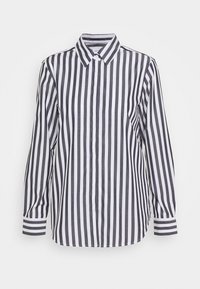 Randig skjorta med svart och vit vertikal randning, knappförslutning fram, krage, långa ärmar med manschettdetaljer, av bomullsmaterial.
