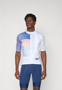 Short-sleeve cycling jersey features a white body with blue and orange horizontal stripes, textured sleeves, and a front zipper. Navy cycling shorts.