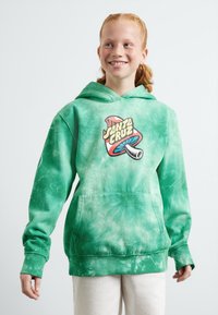 Green tie-dye hoodie with a front pocket and a colorful "Santa Cruz" graphic. Soft fabric with a relaxed fit and long sleeves.