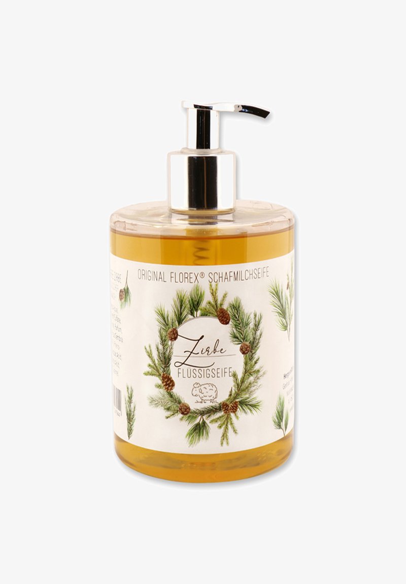 Pumpspenderflasche für flüssige Seife, klar mit goldenem Inhalt, dekoratives Etikett mit grünen Kiefernzweigen und Tannenzapfen.