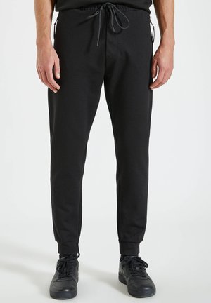 Pantalon de survêtement - black