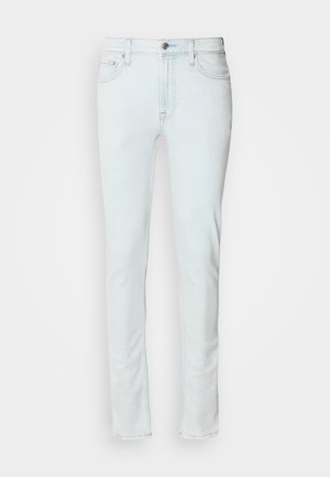 Light blue denim jeans with a straight-leg design, five pockets, and a front button closure. Features subtle stitching and a classic fit.