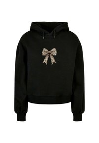 Sudadera corta negra con un lazo de estampado de leopardo bordado en la parte frontal. La tela es suave, con mangas largas y ajustadas, y capucha con cordón.