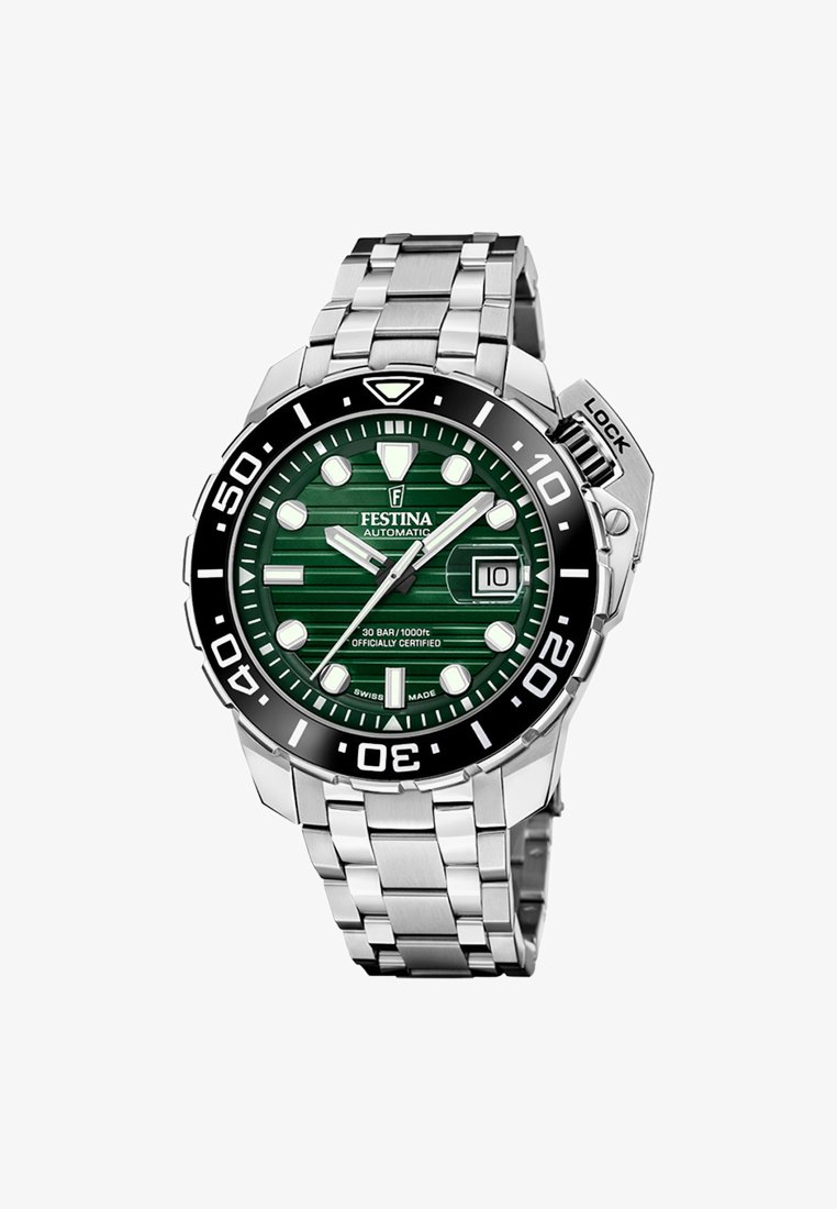 Armbandsur i rostfritt stål med en grönrandig urtavla, vita timmarkörer och svart bezel. Har automatisk rörelse och datumvisning vid klockan 3.