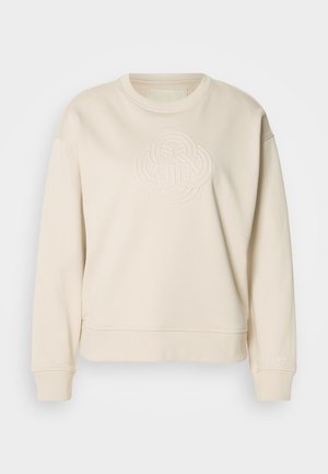 Roomkleurige sweatshirt van zacht materiaal, met een textuur en een reliëfdesign in een ronde vorm aan de voorkant en ribgebreide manchetten en een zoom.