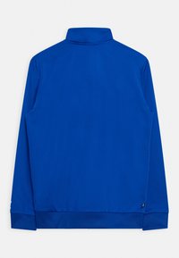 Blue long-sleeve track jacket with ribbed cuffs and hem, high collar, shown from the back on a white background.