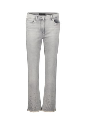 Graue Jeans aus Denim mit ausgestellter Form, verziert mit Strasssteinen am Saum und ausgefranstem Abschluss. Klassisches Fünf-Taschen-Design.