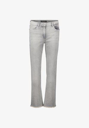 Graue Jeans aus Denim mit ausgestellter Form, verziert mit Strasssteinen am Saum und ausgefranstem Abschluss. Klassisches Fünf-Taschen-Design.