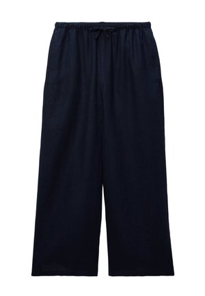 Pantalon large bleu marine avec taille élastique et cordon de serrage, avec poches latérales.