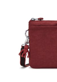 Kipling RIRI - Axelremsväska - flaring rust