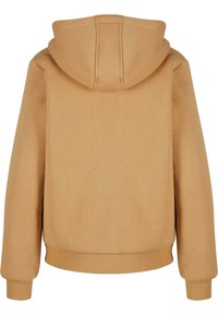 Hoodie u svijetlosmeđoj boji, napravljen od mekog materijala. Ima rebraste narukvice i donji rub, sa jednostavnim, čistim dizajnom.