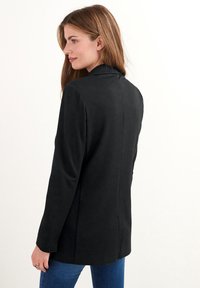 Next Kort kappa / rock - black