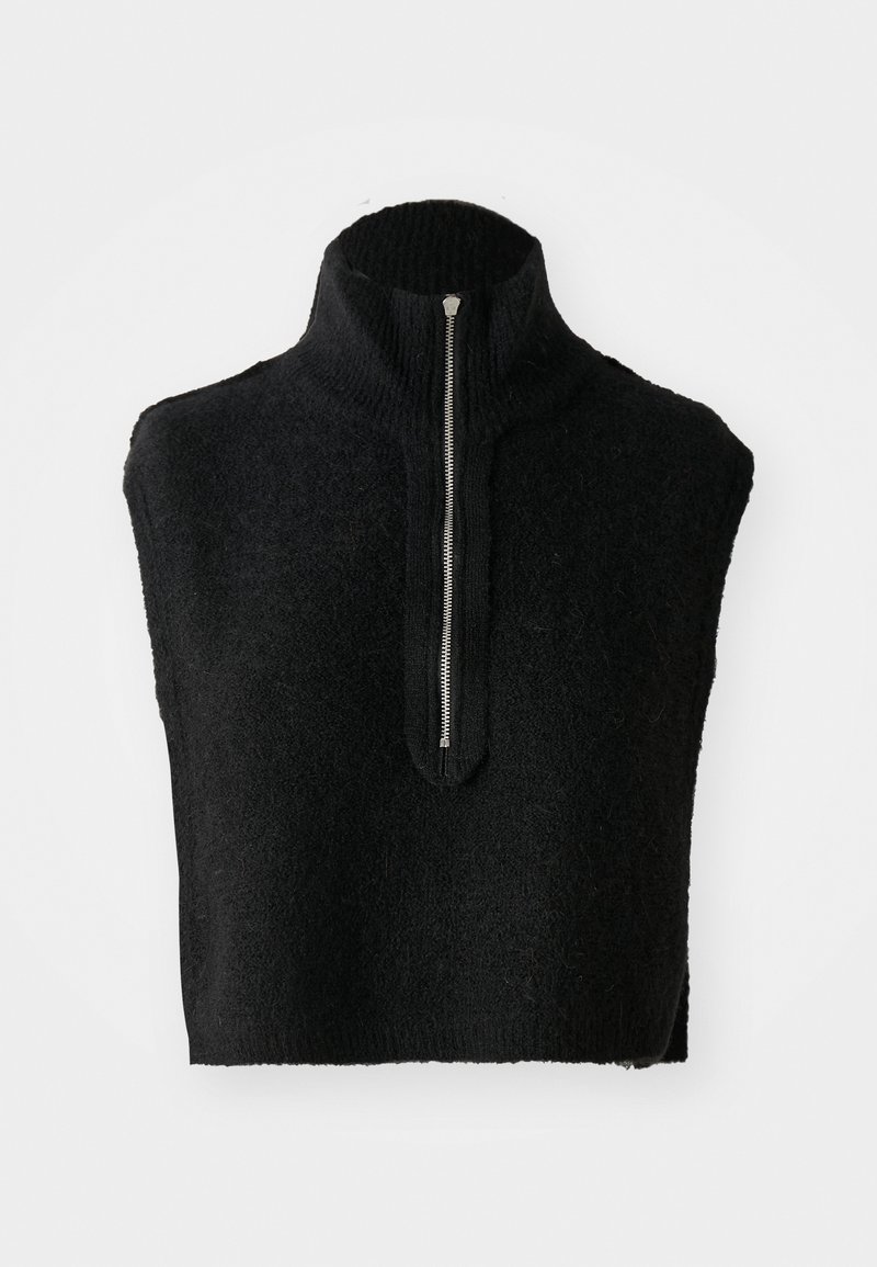 Black knitted sleeveless turtleneck vest with a front silver zipper extending halfway down the chest.