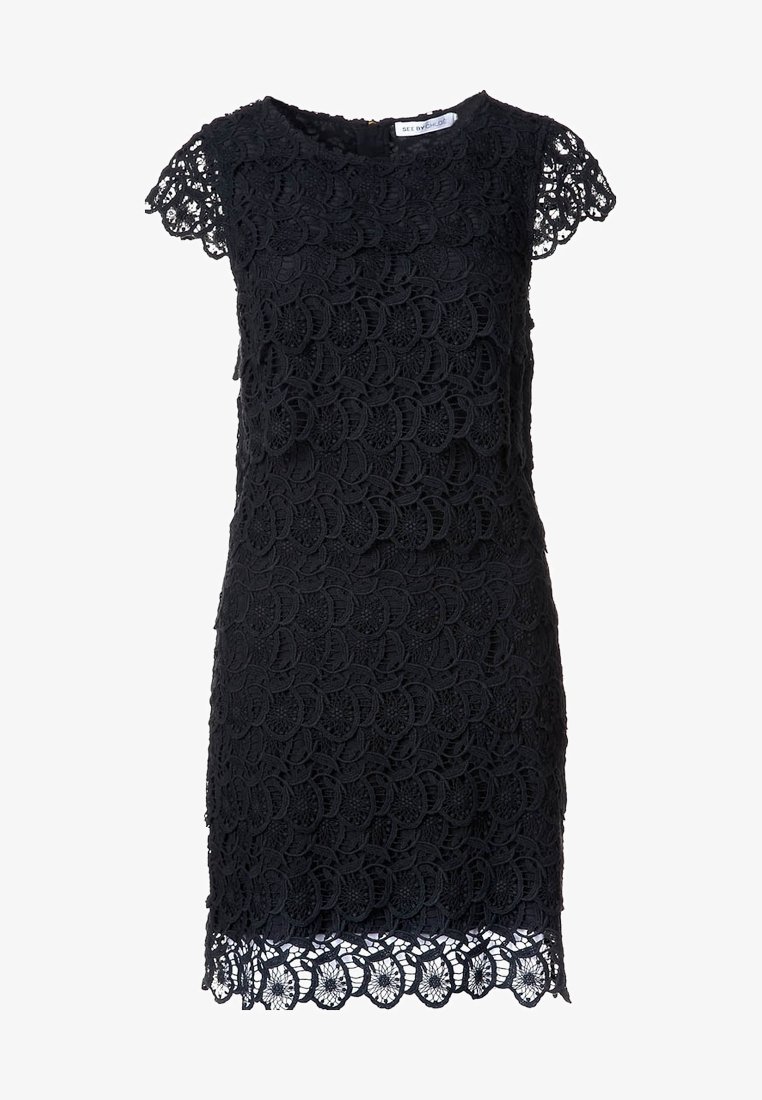 Robe courte noire en dentelle à manches courtes, ourlet festonné et motifs floraux circulaires, longueur genoux, silhouette ajustée, étiquette See By Chloé au niveau de l'encolure.