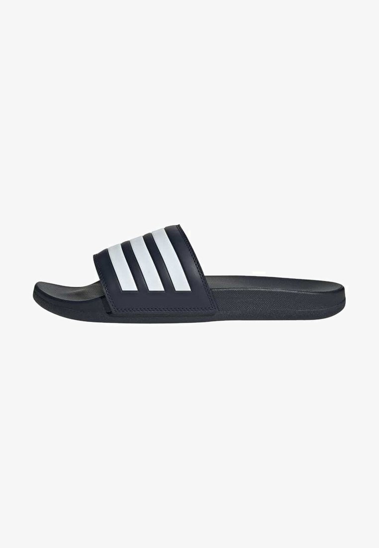 Navy slide sandal with a textured black sole, featuring a wide upper strap adorned with three white stripes. Made of synthetic material.