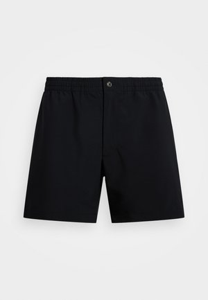 Svarta simbyxor med elastisk midja, snörning och knappstängning, tillverkade i ett slätt och lätt tyg.