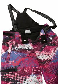 Kolorowe spodnie narciarskie z różowym, czarnym i niebieskim wzorem w kropki. Posiadają regulowane paski, zamki błyskawiczne i kieszenie dla funkcjonalności.