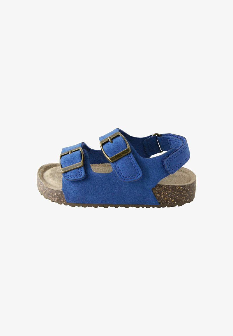 Sandalo blu con due cinturini regolabili con fibbia, cinturino posteriore con velcro e suola con texture effetto sughero e fondo strutturato.