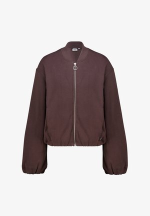Brown bomber jacket with a zip front, round neck, and oversized sleeves. Made from soft fabric with a gathered hem and a circular zipper pull.