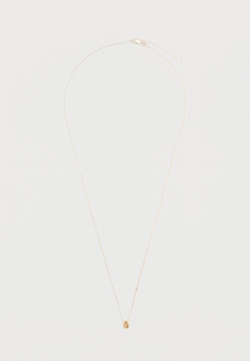 Χρυσή κρεμαστή αλυσίδα με λεπτή μεταλλική αλυσίδα, που διαθέτει έναν οβάλ χειροποίητο μενταγιόν στο κέντρο και κλείσιμο με γαρίδα.