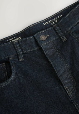 Jeans in denim blu scuro con una vestibilità dritta. Le caratteristiche includono una chiusura con bottone, passanti per cintura e dettagli di cucitura visibili. Taglia 34 R.