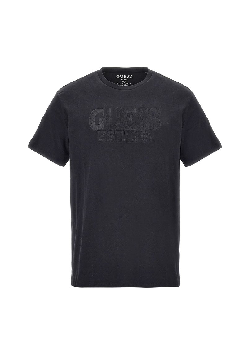 Sort T-shirt med korte ærmer og rund hals med prægede "GUESS EST. 1981" tekst på brystet.